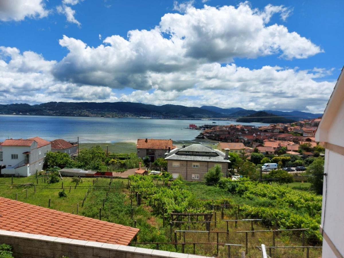 Apartamentos Casa Mucha Комбарро Экстерьер фото